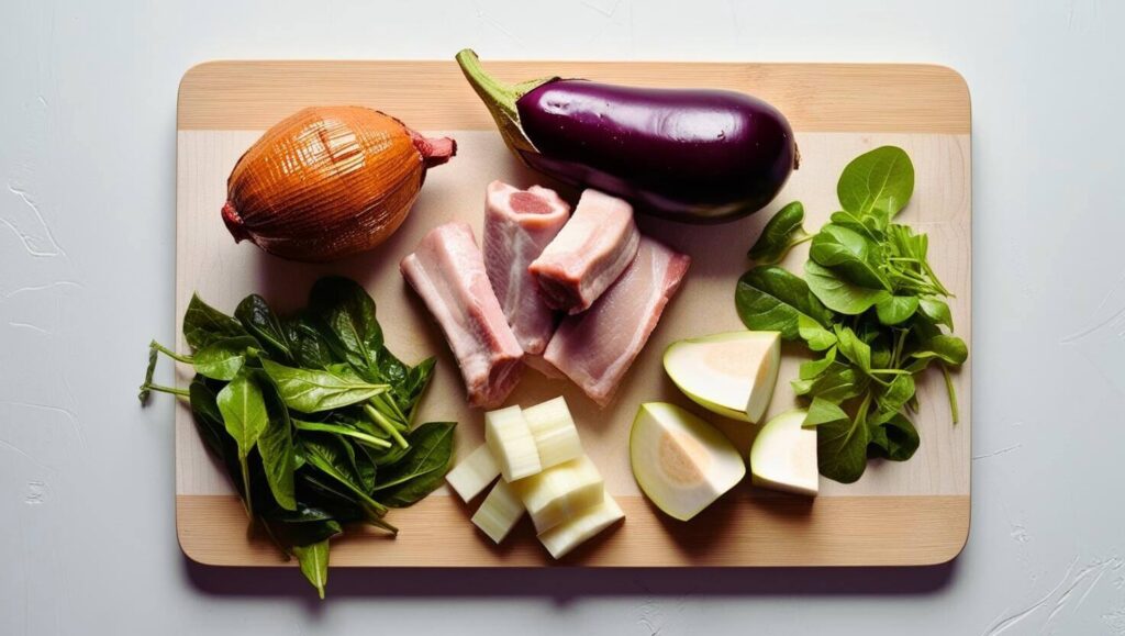 Fresh ingredients for sinigang recipe, including tamarind, pork, and vegetables